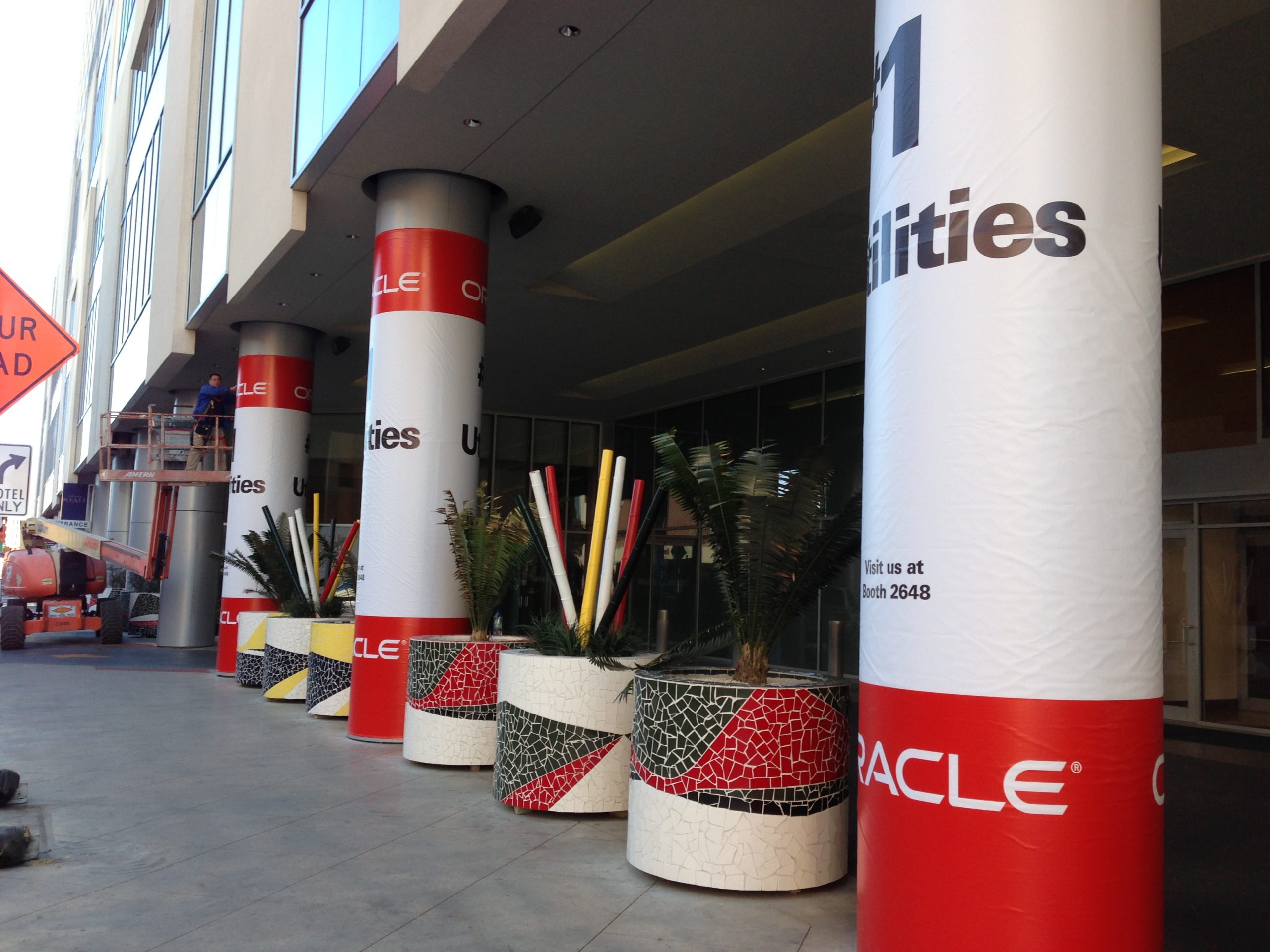 Oracle Vinyl Wrap on Front Columns - Green Light Graphics